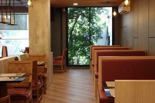 Aparthotel The Sunreno Serviced Apartment