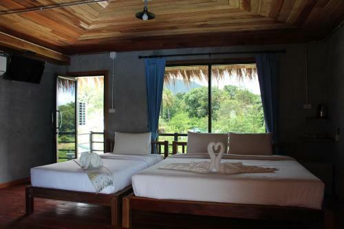 Hostal The Noi Guest House & Restaurant