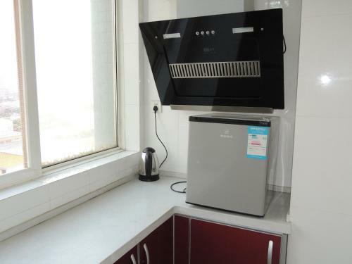 Aparthotel Xi'an Haoting Holiday Apartment
