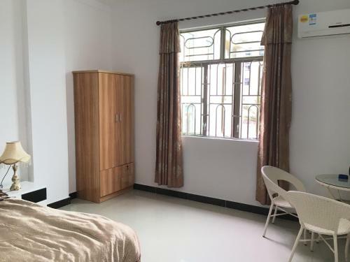 Apartamento Shuangyuewan Happy Inn