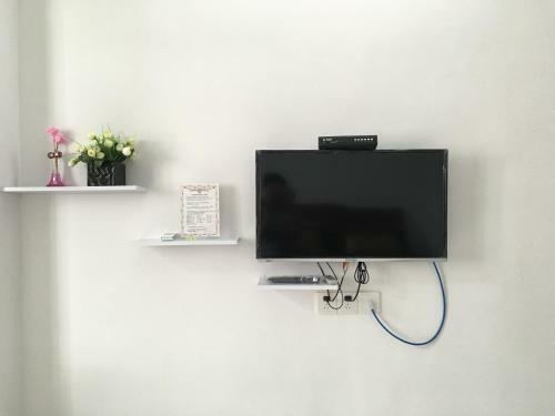 Apartamento Shuangyuewan Happy Inn