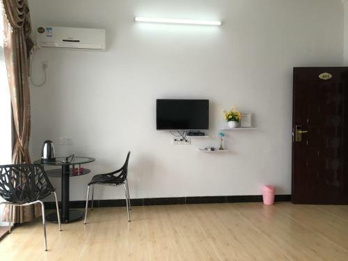 Apartamento Shuangyuewan Happy Inn