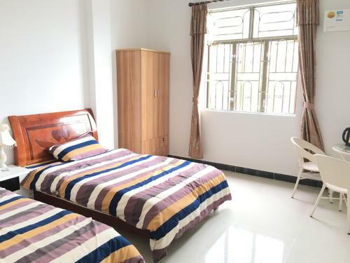 Apartamento Shuangyuewan Happy Inn