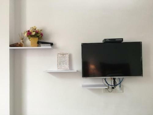 Apartamento Shuangyuewan Happy Inn