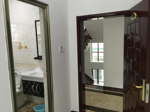 Apartamento Shuangyuewan Happy Inn
