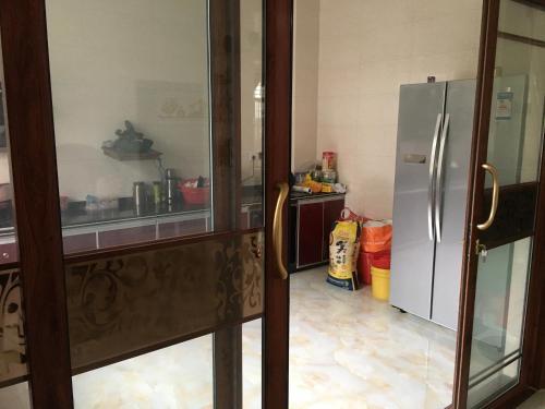 Apartamento Shuangyuewan Happy Inn