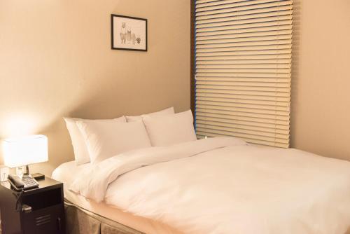 Check Inn Jeju Hotel