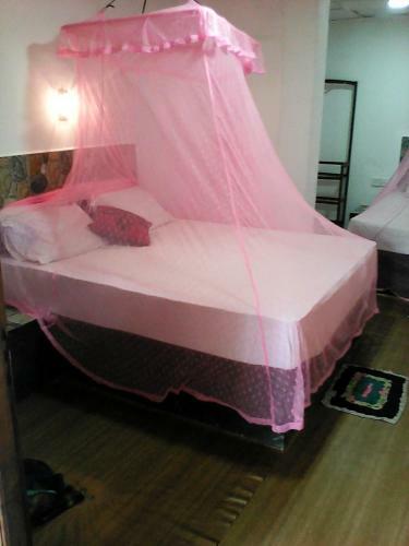 Hostal Lotus Inn Tourist Resort