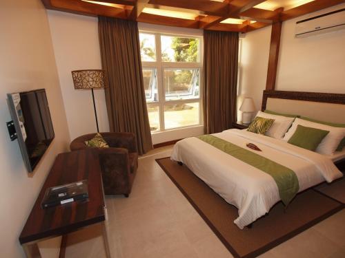 Aparthotel Vida Homes Condo Resort