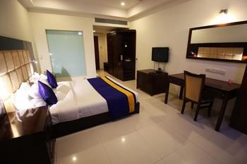 Hotel Oyo Premium Sola Sg Highway