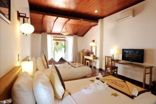 Hotel Vinh Hung Riverside Resort & Spa