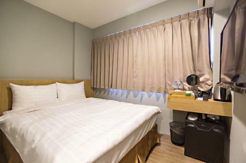 Posada Traveller Inn Tiehua Light Spot Hotel