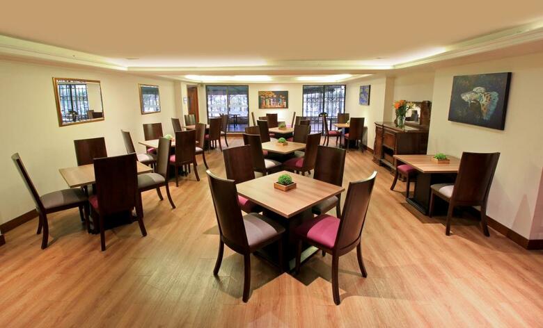 Hotel Windsor House Inn By Geh Suites