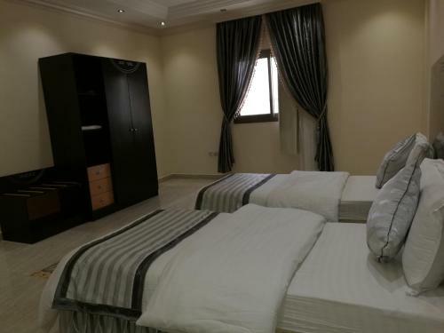 Apartamento Al Ezzah Palace Hotel Suites