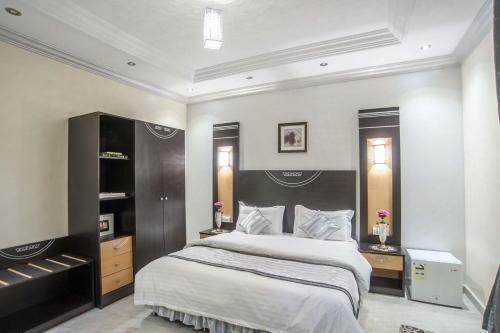 Apartamento Al Ezzah Palace Hotel Suites