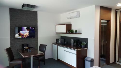 Apartamento Triumph Inn