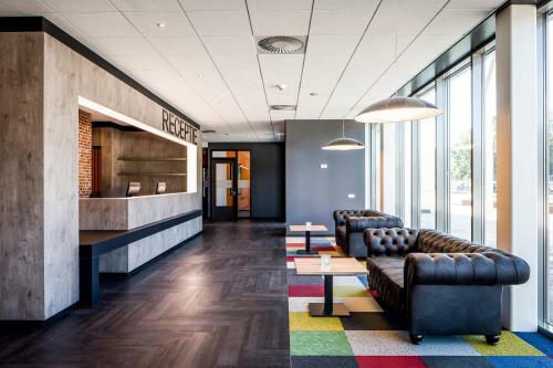 Hampshire Hotel - Fitland Oss