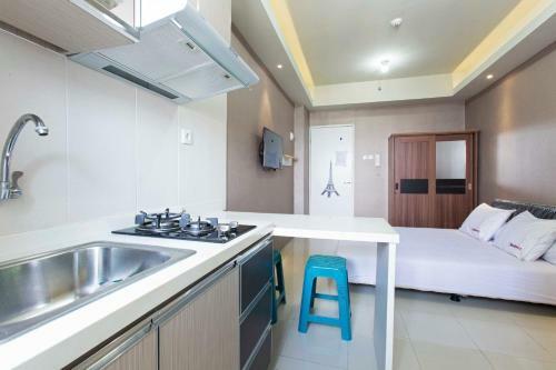 Hostal Reddoorz Apartment @ Pegangsaan Kelapa Gading