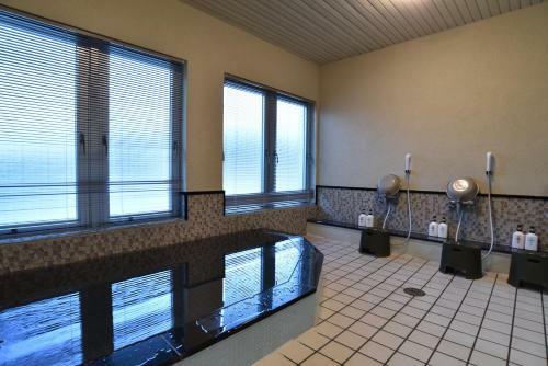 Posada Petit Hotel New Port Club