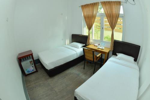 Bed & Breakfast Ngapali Banyan Boutique Hostel