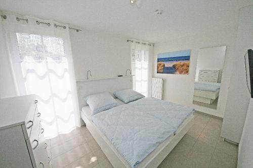 Apartamento Haus Meeresblick - Ferienwohnung D�nenblick Mit Terrasse