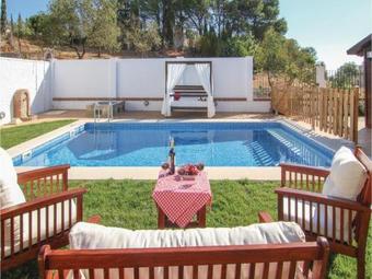 Four-bedroom Holiday Home In Yunquera