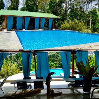 Hostal Tropical Paradise Bungalows