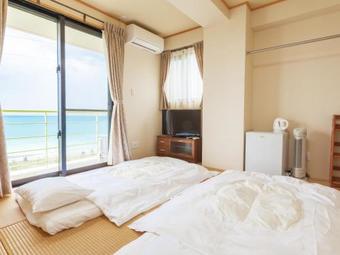 Apartamentos Kariyushi Condominium Ocean Hills Chouraku Stay