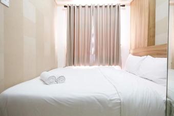 Minimalist 2br Serpong Greenview Apartment By Travelio