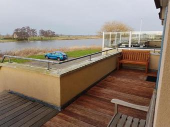 Semi-detached Holiday Home Floating On A Lake In Friesland