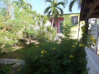 Bungalow With 2 Bedrooms In Petit-canal, With Wonderful Mountain View, Pool Access, Enclosed Garden - 8 Km From The Beach