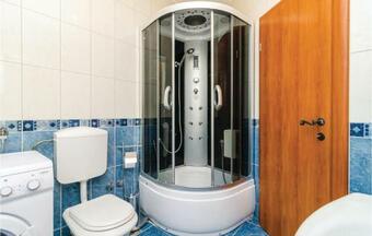 Four-bedroom Holiday Home In Komin