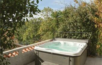 Two-bedroom Holiday Home In Montegrossu