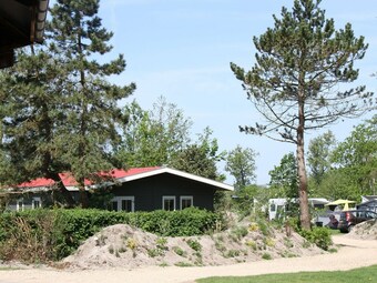 Lovely Chalet With Covered Terrace, Close To The North Sea