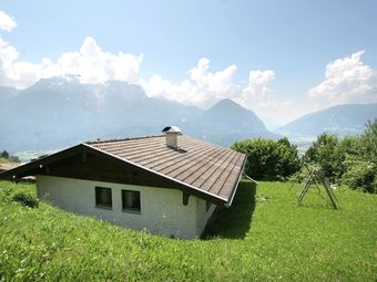 Quaint Chalet With Garden, Terrace, Fireplace,play Equipment