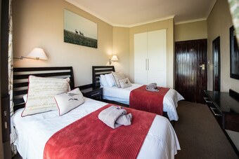 Apartamentos First Group Qwantani