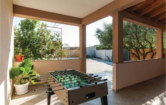 Three-bedroom Holiday Home In Galovac