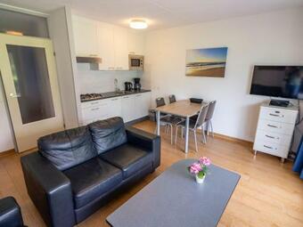 Apartment In Nieuwvliet With Roof Terrace, Garden, Parking