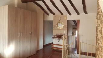 Rural Stone House With Wood Fireplace