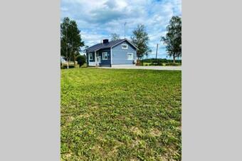 Omakotitalo Rauhallisessa Jokilaaksossa