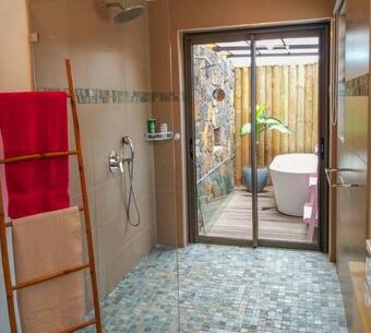 Pool Villa Surrounded By Tropical Greenery