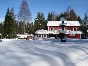 Bed & Breakfast Sk�lsj�g�rden Timber Lodge
